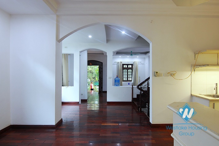 Unfurnished 4 bedrooms house with yard and garage for rent in Au Co st, Tay Ho area.
