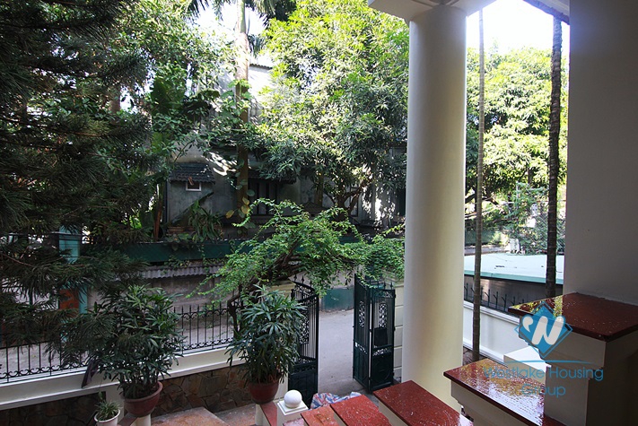 Unfurnished 4 bedrooms house with yard and garage for rent in Au Co st, Tay Ho area.