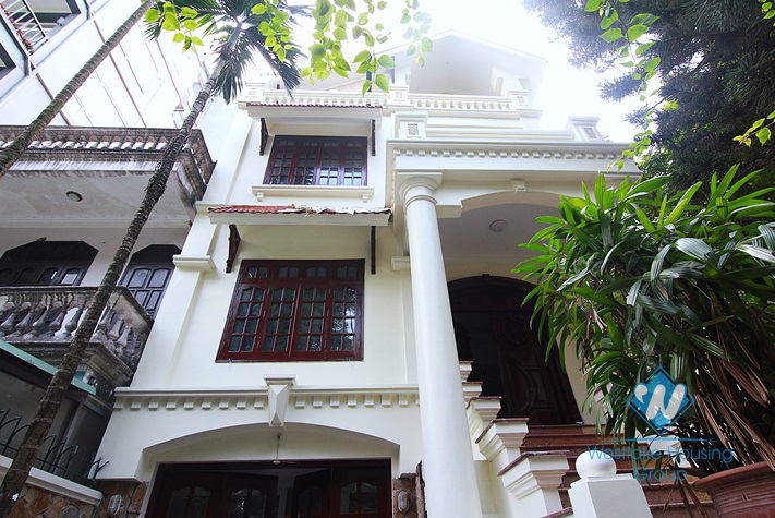 Unfurnished 4 bedrooms house with yard and garage for rent in Au Co st, Tay Ho area.