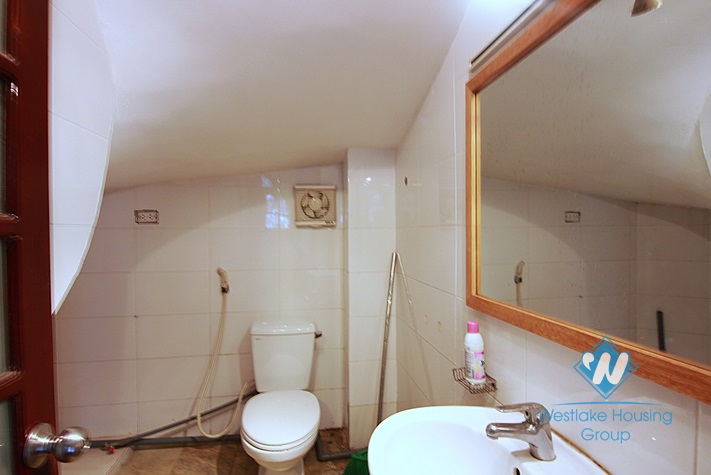 Unfurnished 4 bedrooms house with yard and garage for rent in Au Co st, Tay Ho area.