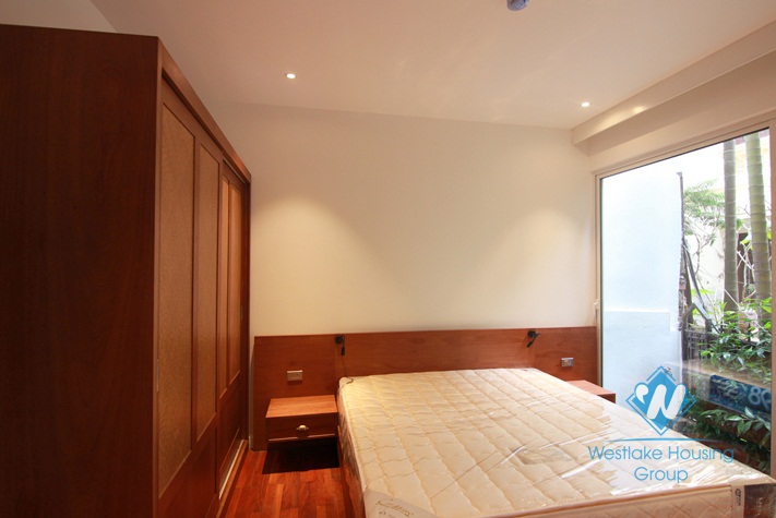 A cozy and  elegant apartment on the ground floor for rent in Dang Thai Mai