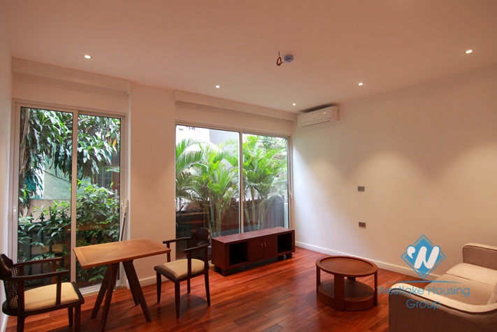 A cozy and  elegant apartment on the ground floor for rent in Dang Thai Mai