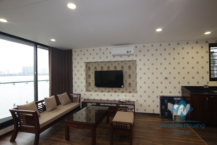 Apartment for rent in Tay Ho with balcony and amazing lake view.