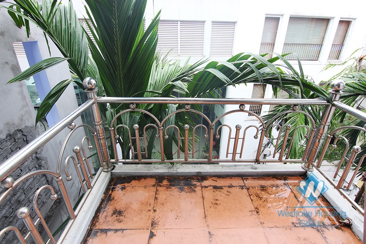 Cheap 4 bedrooms house with big yard for rent in Tay Ho district, Hanoi.