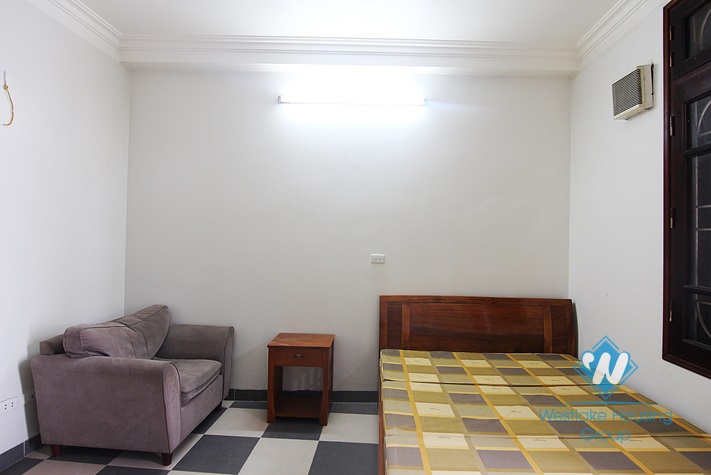 Cheap 4 bedrooms house with big yard for rent in Tay Ho district, Hanoi.