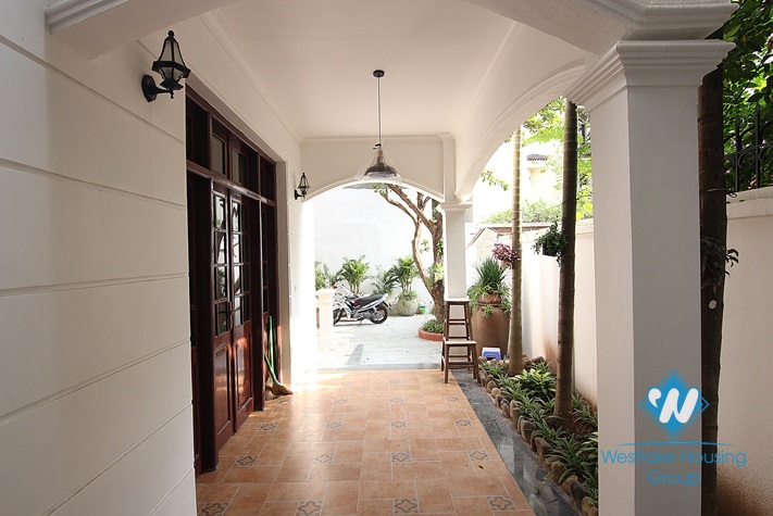 White house with courtyard for rent in Tay Ho district  
