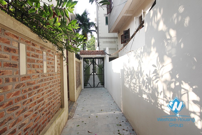 White house with courtyard for rent in Tay Ho district  