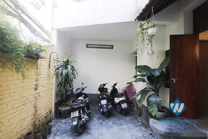 A nice house with unique style for rent on Vinh Tuy street 