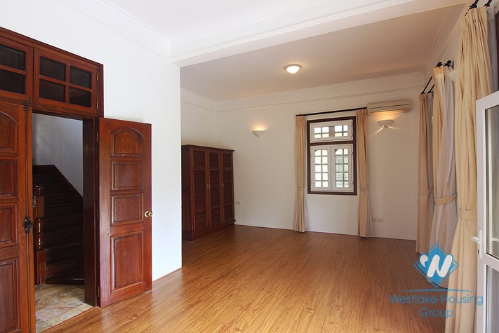 Lovely house with courtyard and garage for rent on To Ngoc Van, Tay Ho, Hanoi