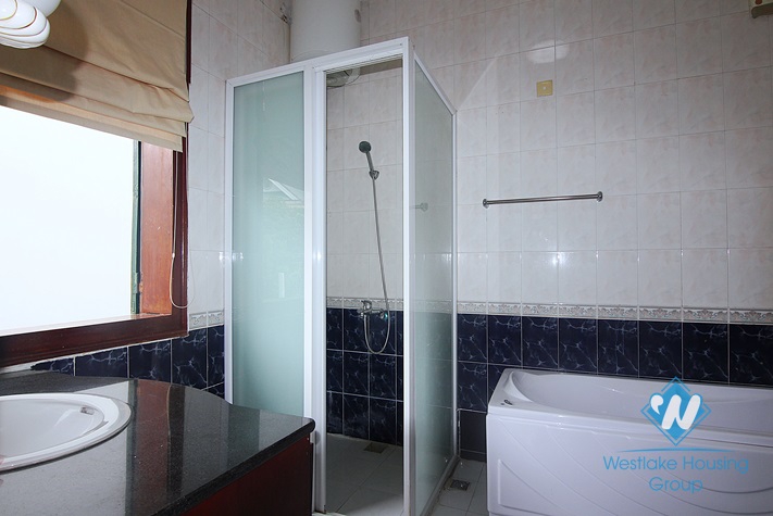 Lovely house with courtyard and garage for rent on To Ngoc Van, Tay Ho, Hanoi