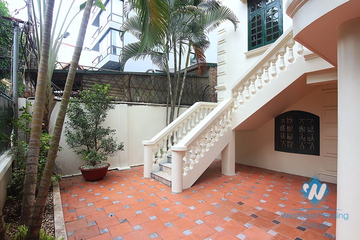 Lovely house with courtyard and garage for rent on To Ngoc Van, Tay Ho, Hanoi