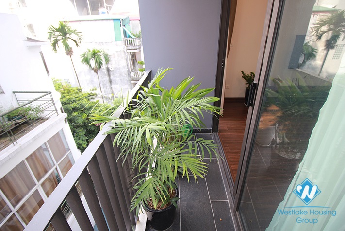 Nice and big apartment with balcony for rent on Tu Hoa street, Tay Ho, Ha Noi