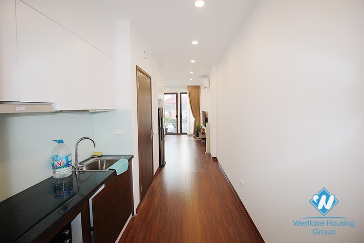 Nice and big apartment with balcony for rent on Tu Hoa street, Tay Ho, Ha Noi