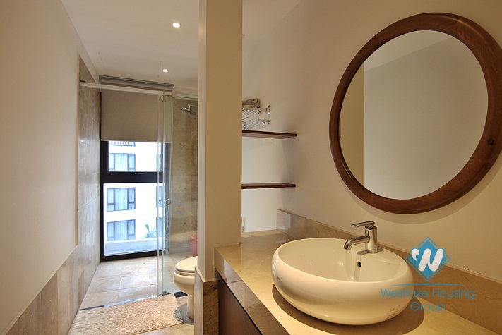 An exquisite 3 bedroom apartment for rent on Dang Thai Mai street