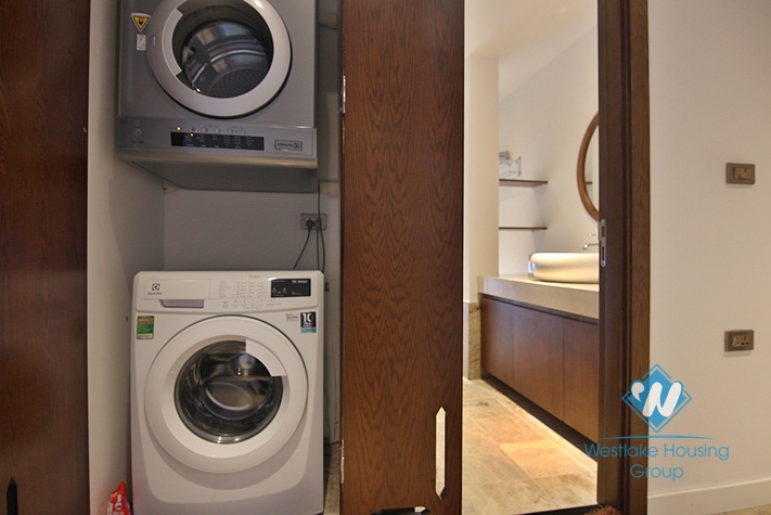 An exquisite 3 bedroom apartment for rent on Dang Thai Mai street