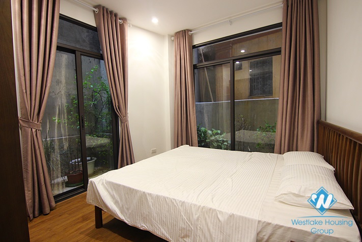 A $350 Nicely Furnished 65sqm 1-Bedroom Apartment for Rent on Dang Thai Mai str., Tay Ho district. 