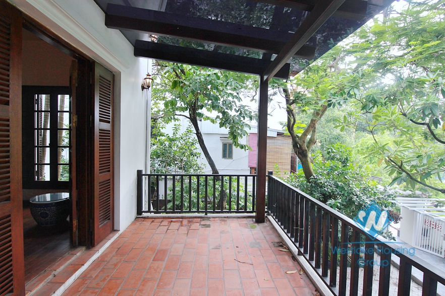 Cosy house with large yard and garden for lease in Xuan Dieu street, Tay Ho, Hanoi