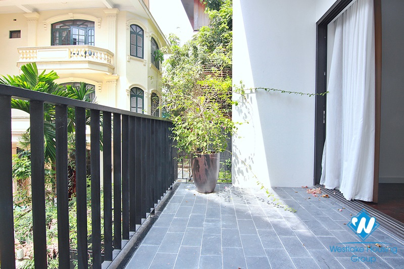 Spacious 4-bedroom apartment with a balcony on Tay Ho street, Tay Ho for rent