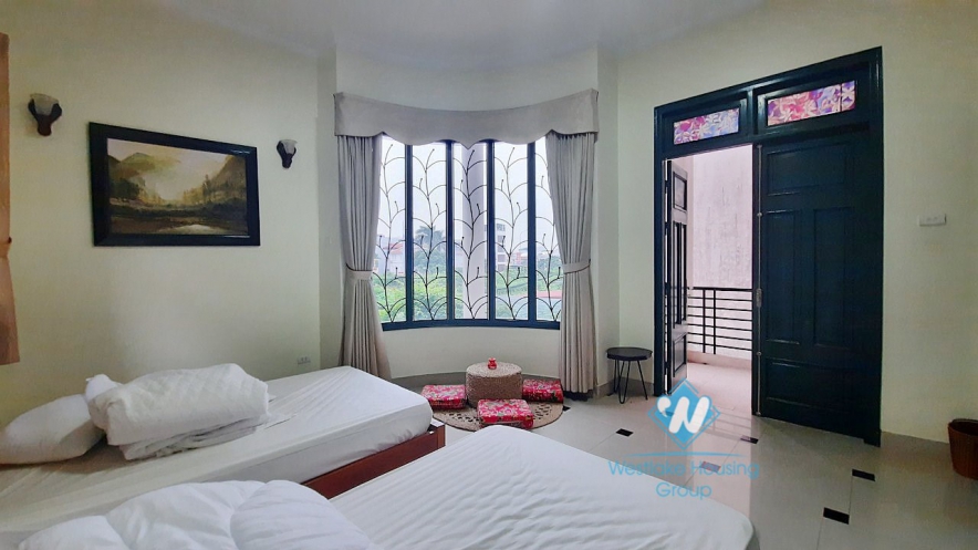 House with four bedrooms and large green garden space for rent in Ngoc Thuy Long Bien