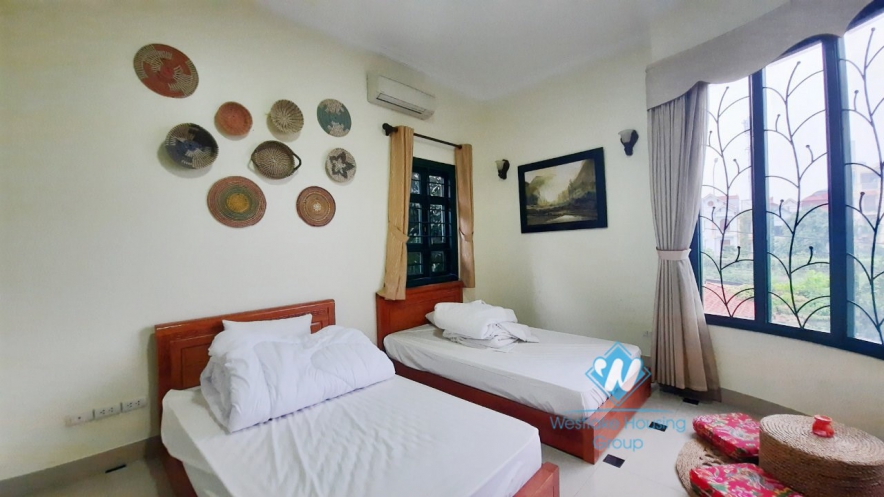 House with four bedrooms and large green garden space for rent in Ngoc Thuy Long Bien