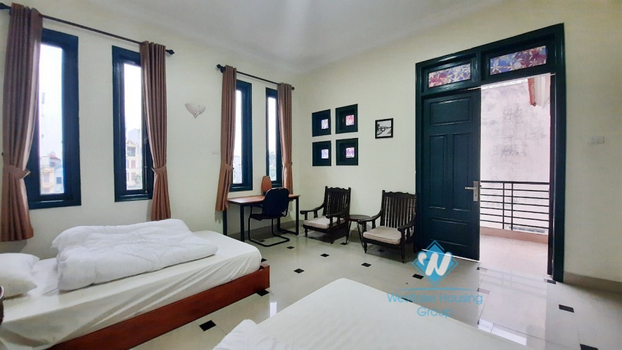 House with four bedrooms and large green garden space for rent in Ngoc Thuy Long Bien