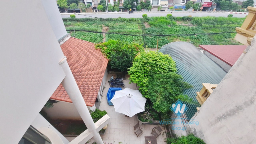 House with four bedrooms and large green garden space for rent in Ngoc Thuy Long Bien