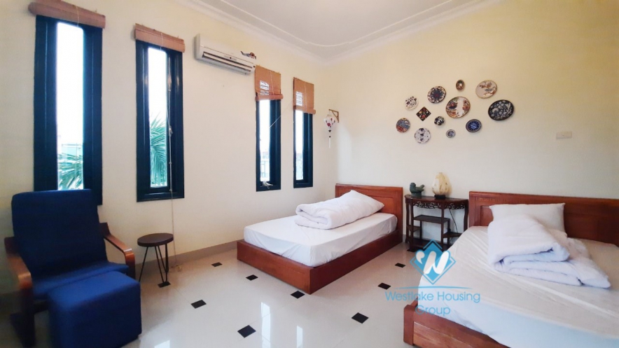 House with four bedrooms and large green garden space for rent in Ngoc Thuy Long Bien