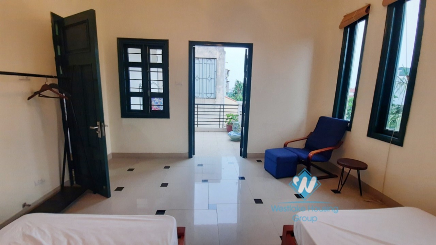 House with four bedrooms and large green garden space for rent in Ngoc Thuy Long Bien