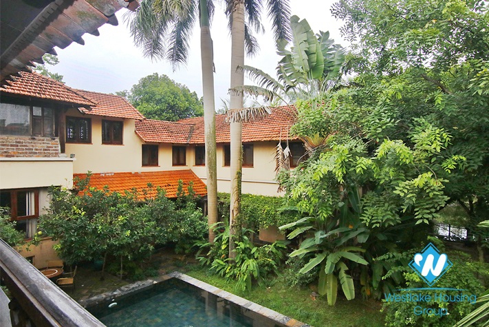 A four-bedroom, garden and swimming pool for rent in Ngoc Thuy near French International School