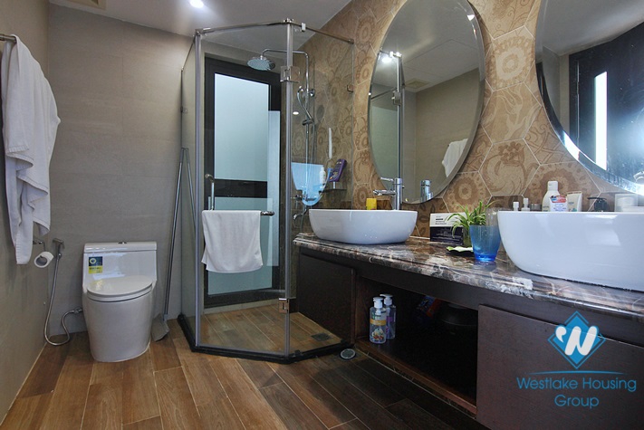 A three-bedroom duplex with lake view on the top floor on Dang Thai Mai street 