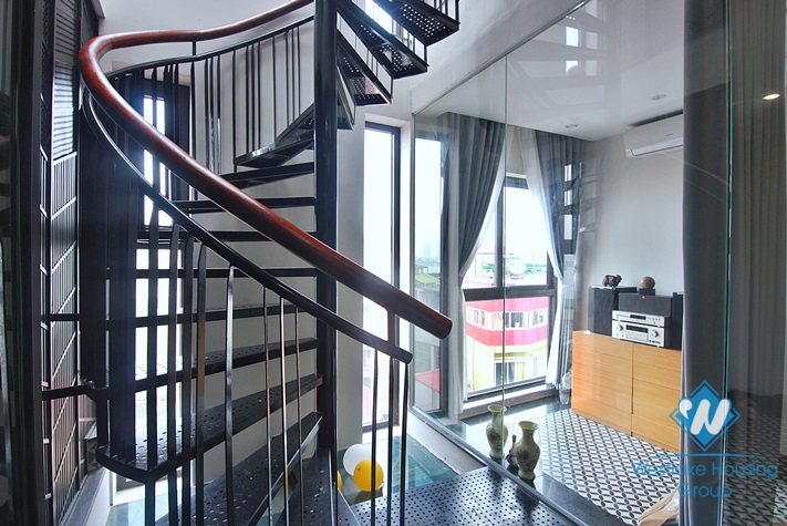 A three-bedroom duplex with lake view on the top floor on Dang Thai Mai street 