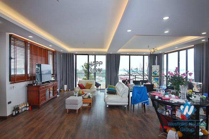 A three-bedroom duplex with lake view on the top floor on Dang Thai Mai street 