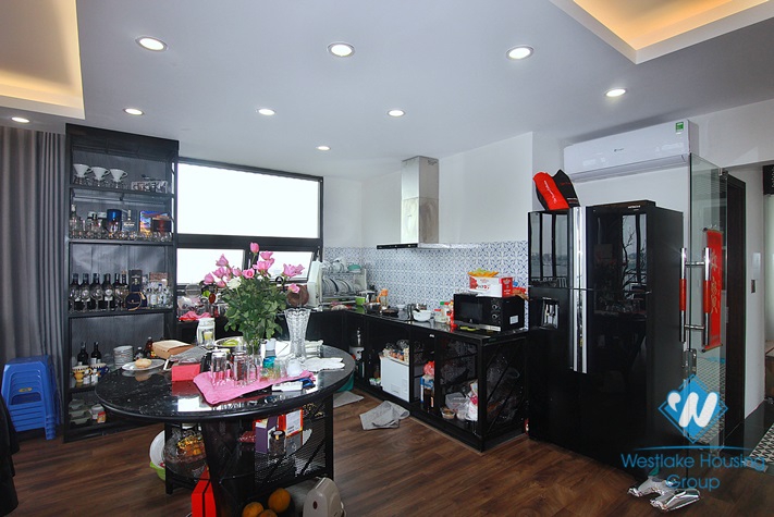 A three-bedroom duplex with lake view on the top floor on Dang Thai Mai street 