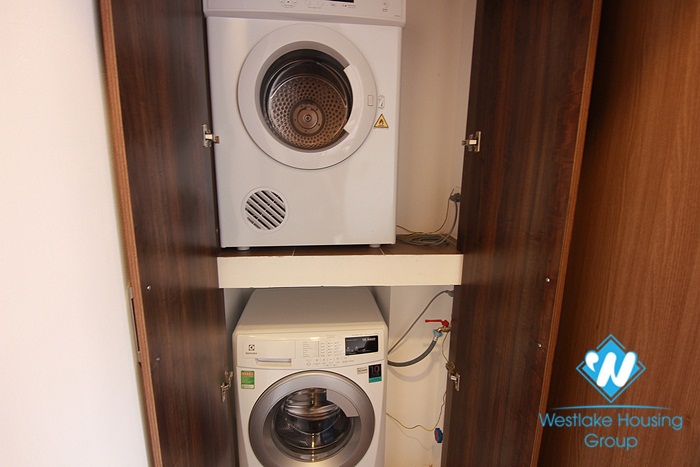 Bright apartment with one bedroom for rent at the Building No 2 alley 32-18 To Ngoc Van st, Tay Ho District