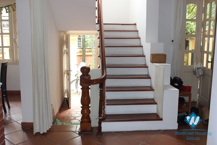 3-floor, unfurnished  house for rent in Xuan Dieu street