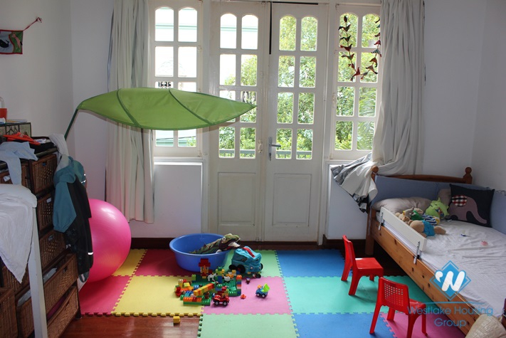 3-floor, unfurnished  house for rent in Xuan Dieu street