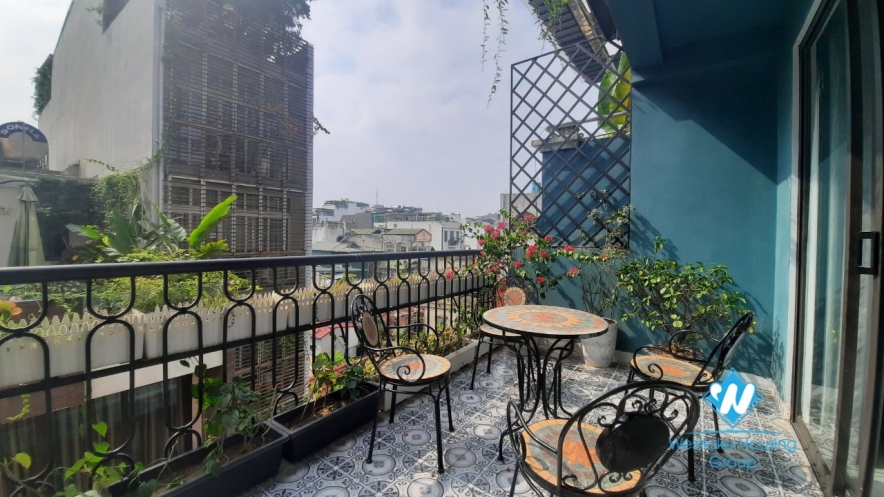 Nice furnished apartment with big balcony for rent in Hoan Kiem.