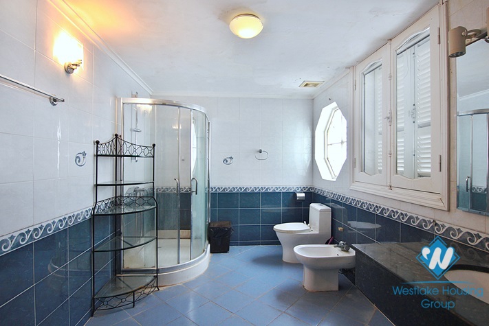 An unfurnished four-bedroom house on Tay Ho street, Tay Ho district