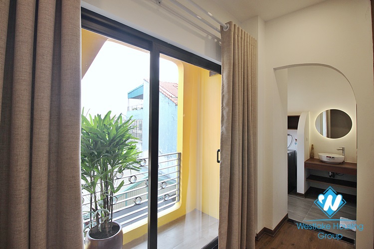 An interesting duplex 1 bedroom apartment for rent on Dang Thai Mai street