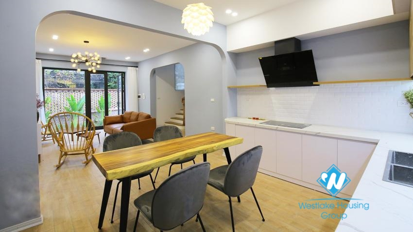 House for rent with four bedrooms and yard around the house in An Duong Vuong, Tay Ho