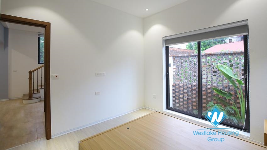 House for rent with four bedrooms and yard around the house in An Duong Vuong, Tay Ho