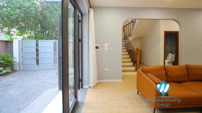 House for rent with four bedrooms and yard around the house in An Duong Vuong, Tay Ho