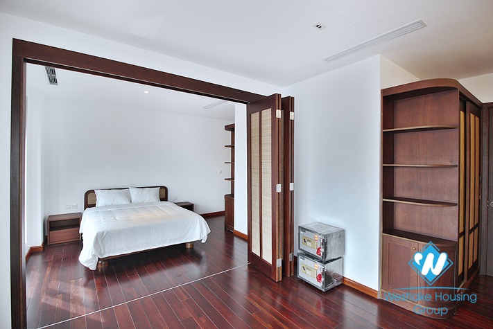 Large three-bedroom apartment with lake view for rent in Tay Ho.