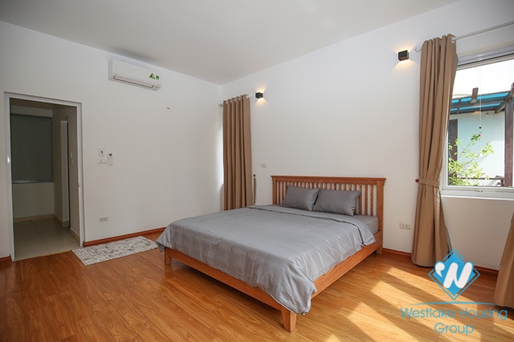Gorgeous house with front yard and top terrace and lake view for rent in Tay Ho, Hanoi
