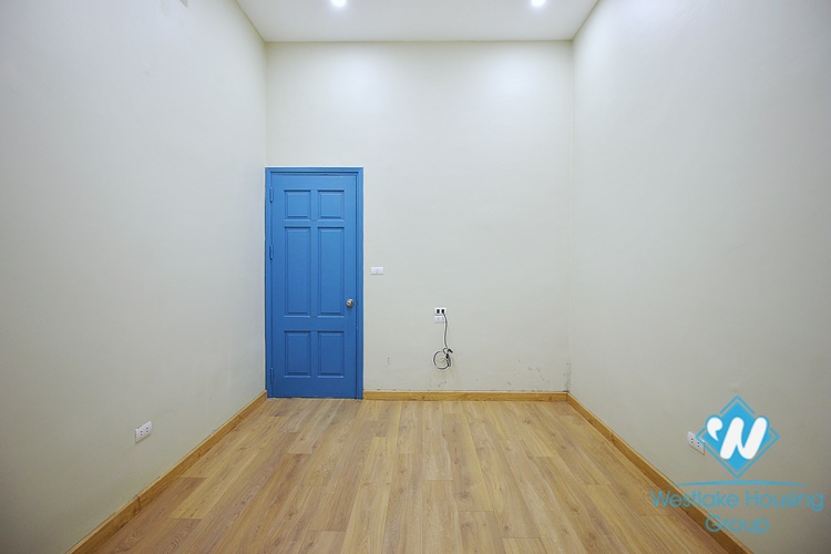 Unfurnished 3 beds house with big yard for rent in Lac Long Quan st, Tay Ho