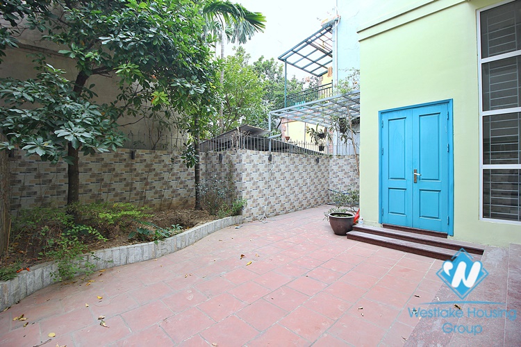Unfurnished 3 beds house with big yard for rent in Lac Long Quan st, Tay Ho