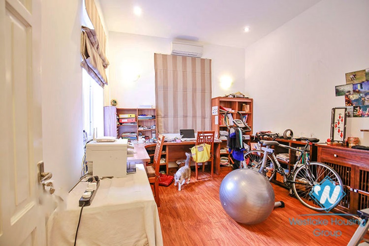 Unfurnished house with front yard for rent in To Ngoc Van street, Tay Ho