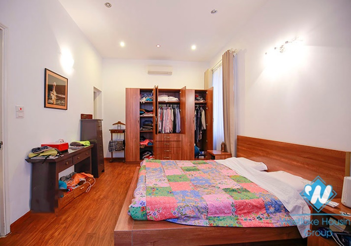 Unfurnished house with front yard for rent in To Ngoc Van street, Tay Ho