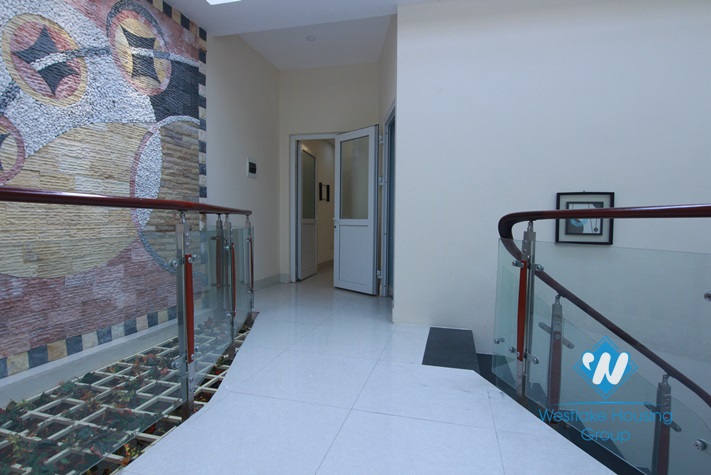 Nice house for rent with large courtyard in Au Co Street, Tay Ho District, Ha Noi