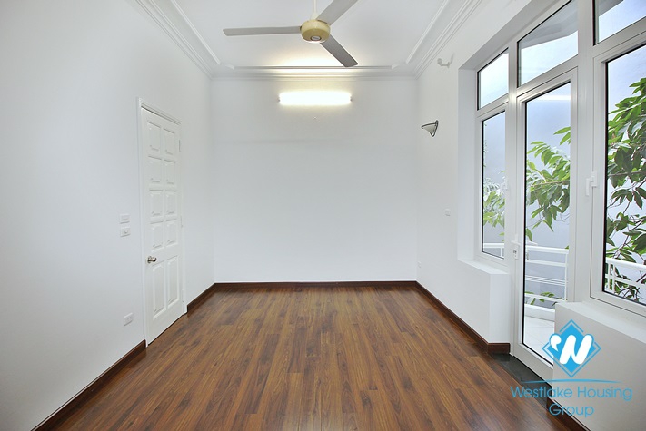 Unfurnished house with big yard for rent in To Ngoc Van st, Tay Ho